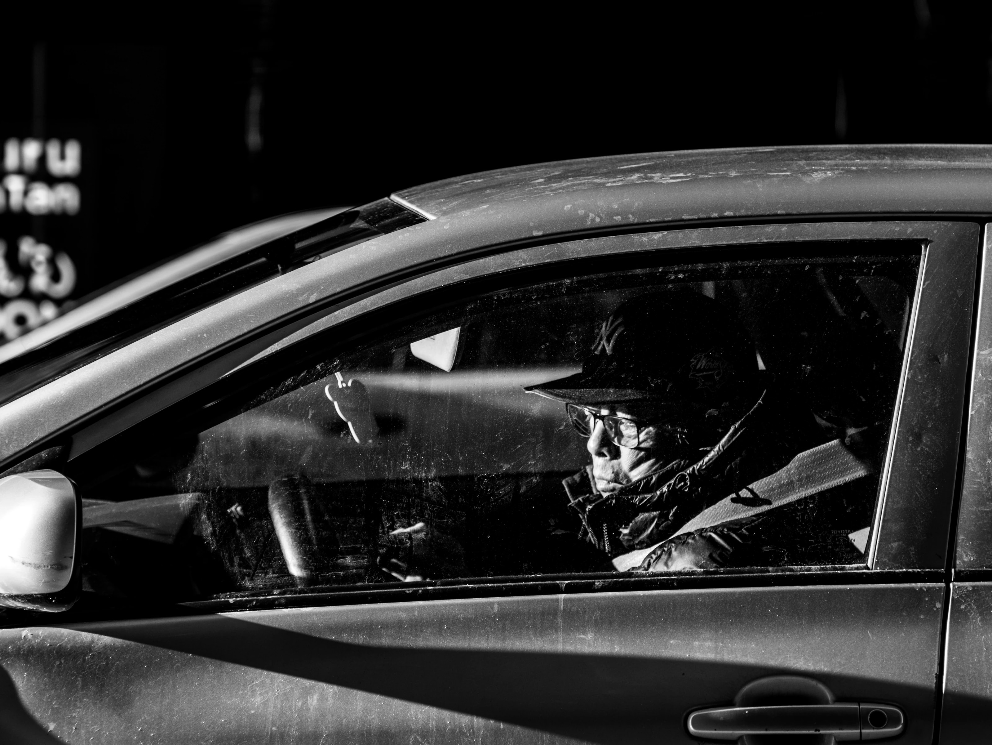 Driver in sidelight, New York
